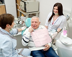 Man visiting dental implant dentist in Willowbrook